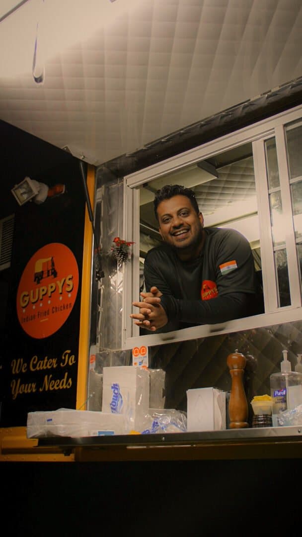 Chef Raj at the Guppy's truck window